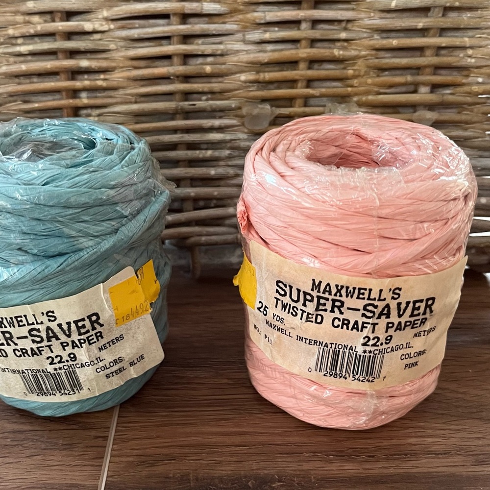 Twisted craft paper for making bows and other craft projects.   2 colors. 50 yds